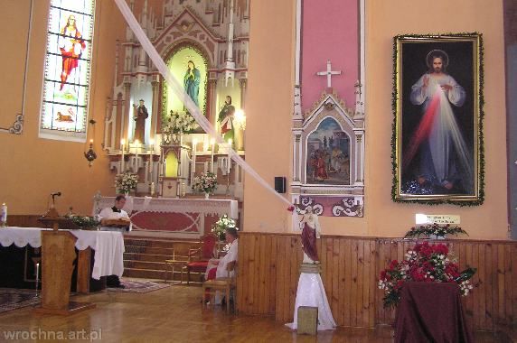 , Obraz umieszczono przy prezbiterium. Na tabliczce umieszczono napis polski
<i>"Jezu ufam Tobie"</i> i litewski <i>"Jezau pasitikiu Tavimi"</i>.